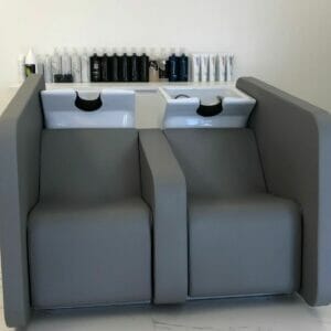 La Signature, Lausanne, Switzerland featuring a coordinating selection of Nelson Mobilier Salon Furniture.