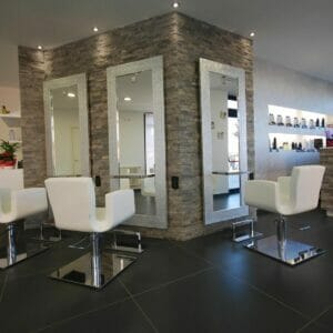 Evelyn Hair Salon, Milan, Italy featuring Nelson Mobilier Salon Furniture