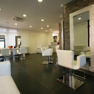 Evelyn Hair Salon, Milan, Italy featuring Nelson Mobilier Salon Furniture