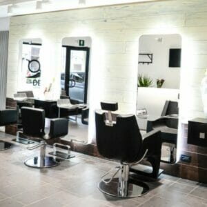 Demo Hair Stylist, Italy featuring a coordinating selection of Nelson Mobilier Salon Furniture in a contemporary setting.