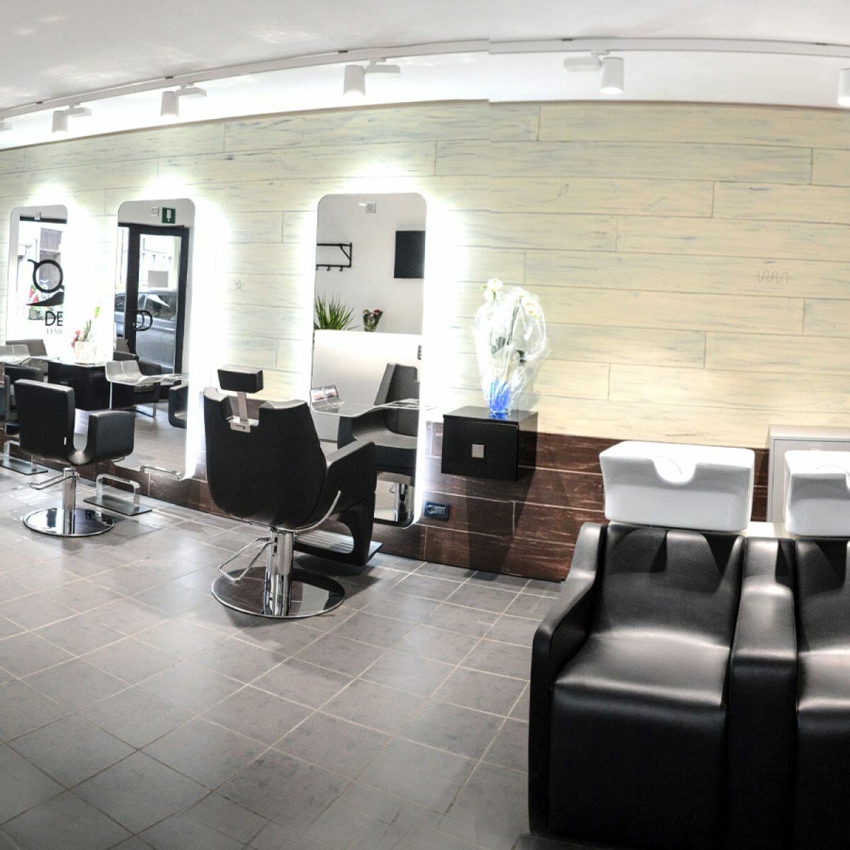 Demo Hair Stylist, Italy featuring a coordinating selection of Nelson Mobilier Salon Furniture in a contemporary setting.