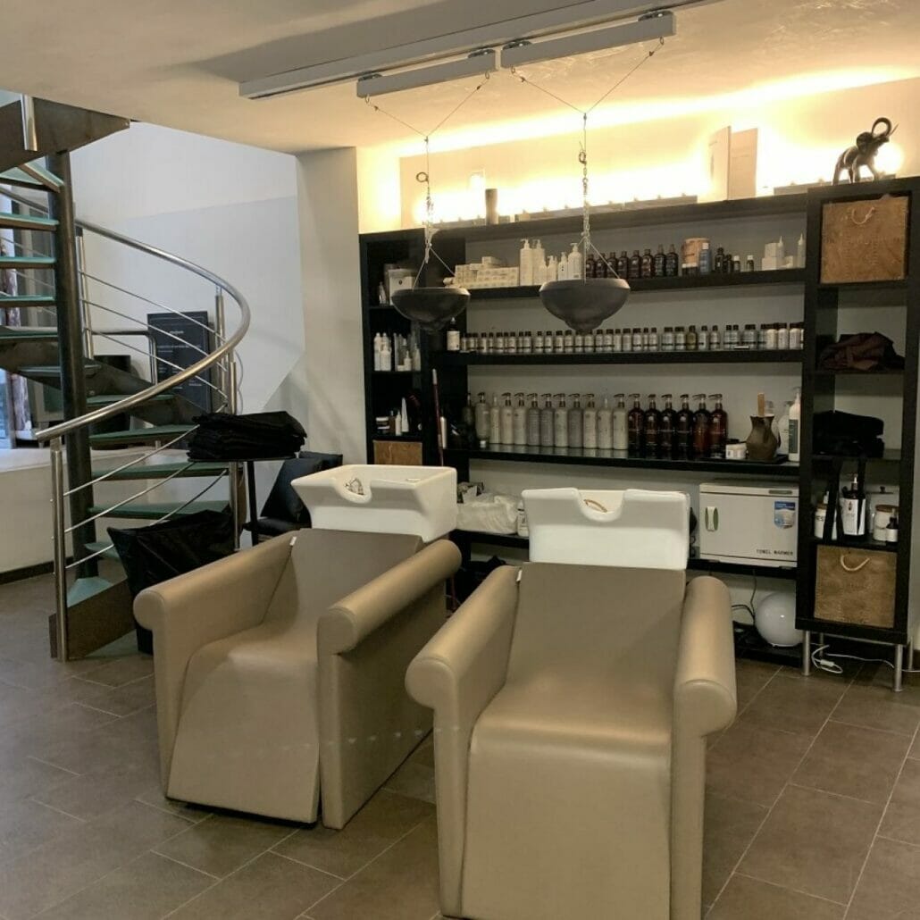 Moran Perruquers, Spain featuring a coordinating selection of Nelson Mobilier Salon Furniture in a contemporary setting.